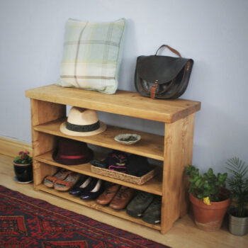Wooden shoe rack bench seat, side view.