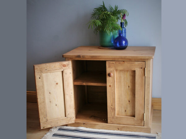 Wooden sideboard cabinet and chunky rustic tv stand with thick double doors.