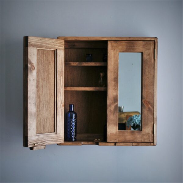 Mirrored bathroom cabinet 65 x 60 x14 with one of the mirror doors open