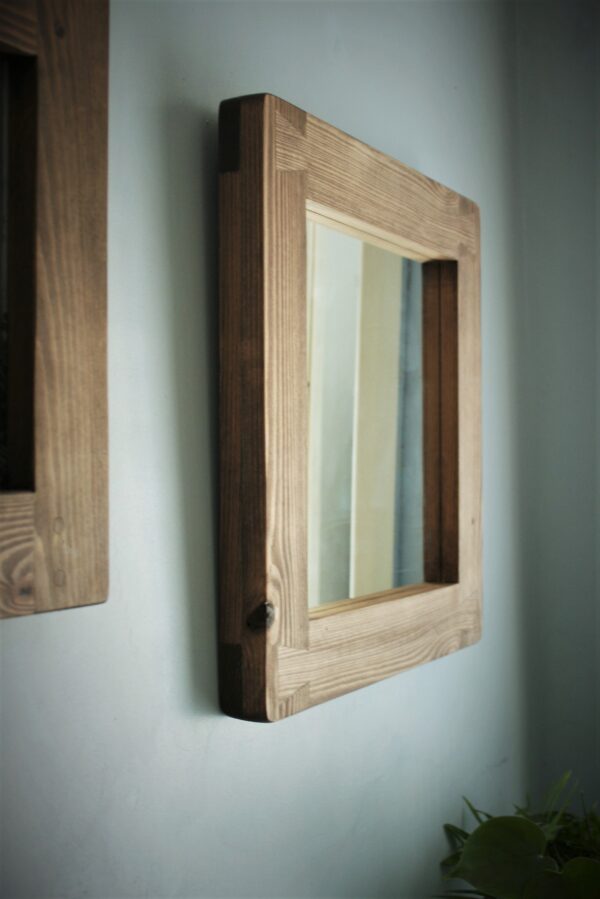 Side view of our square mirror with a natural wooden frame