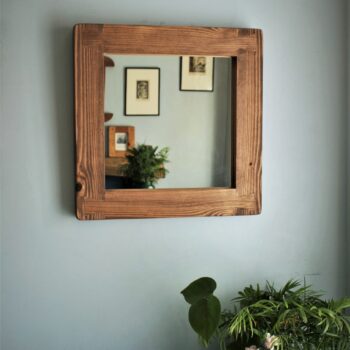 Square mirror with a natural wooden frame handmade in Somerset UK in chunky modern rustic farmhouse style.
