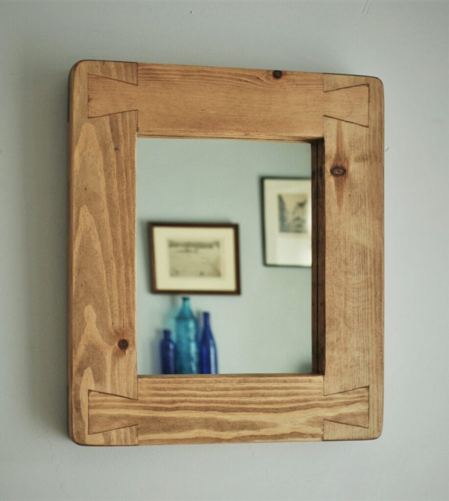 Small mirror with a natural wooden frame 8 x10 inch glass area