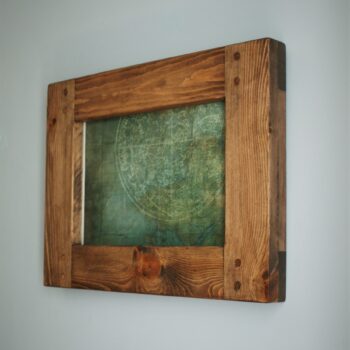 Side view of 8 x 12 inch wooden frame in chunky natural wood