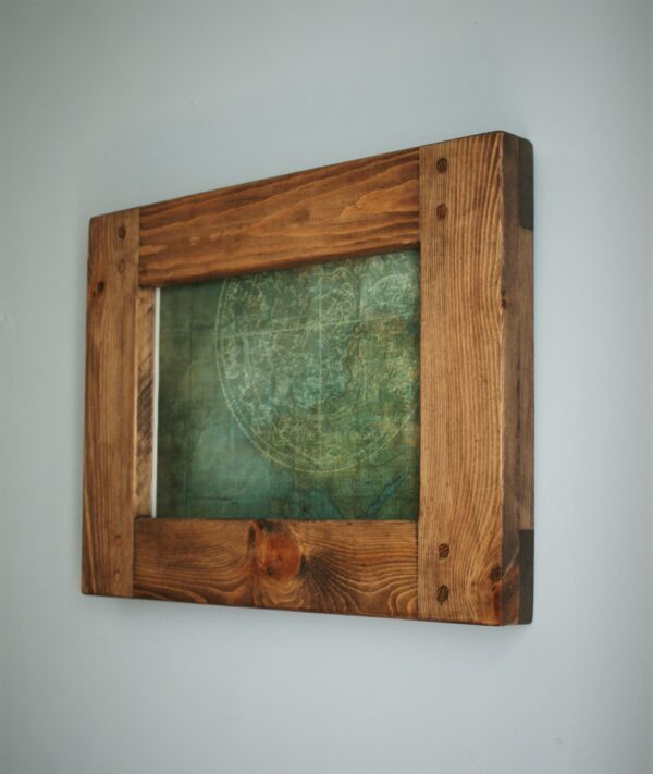 Side view of 8 x 12 inch wooden frame in chunky natural wood