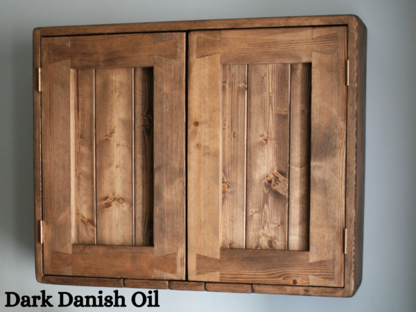 Wooden kitchen cabinet in rustic cottage style, dark wood option.