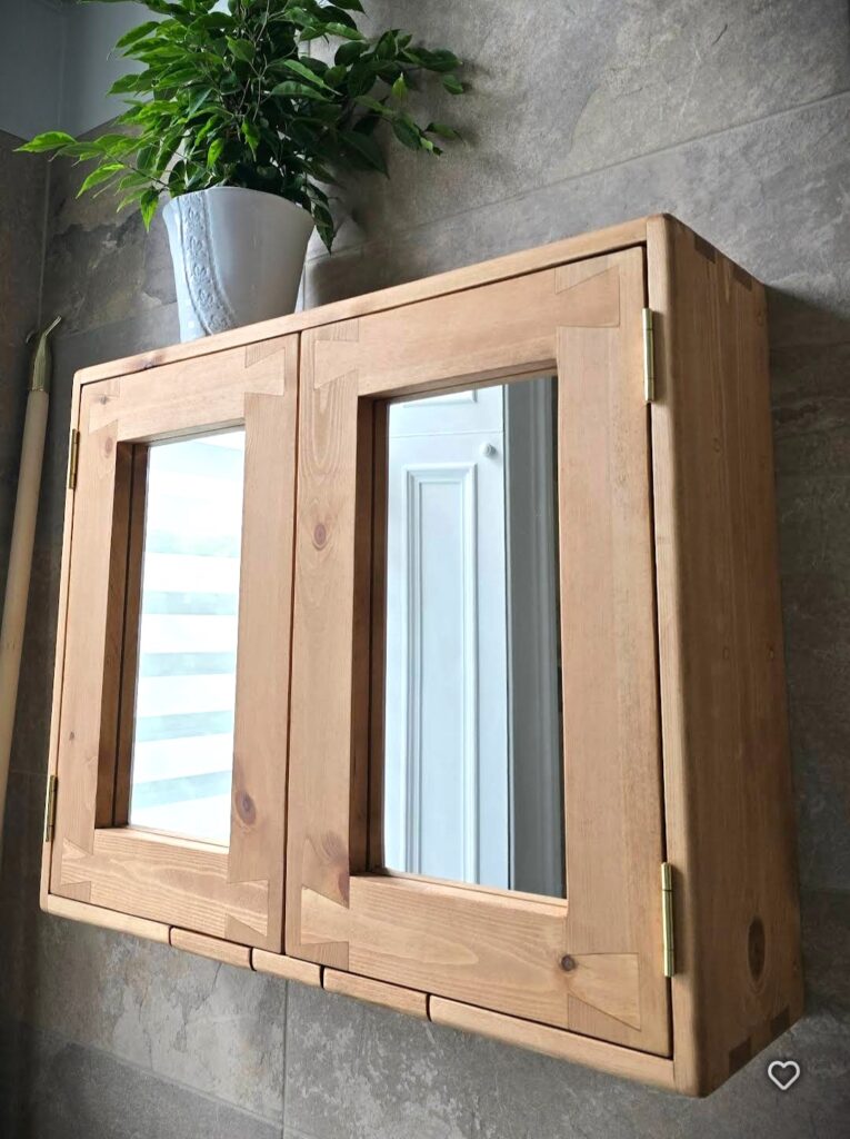 Wooden bathroom cabinet with minimalist double mirror doors, luxury bespoke bathroom furniture from Somerset UK