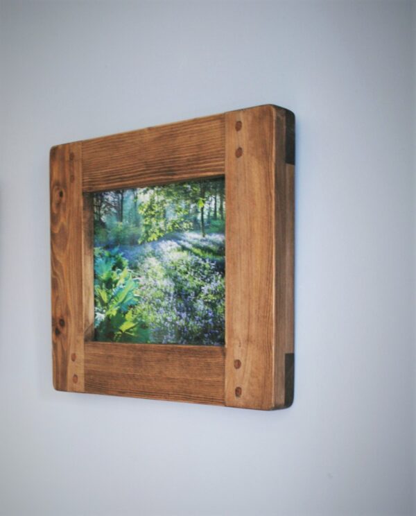 Chunky wooden picture frame for 8 x 10 inch photo or art print. Handmade in Somerset UK, side view of dark wood tone option.