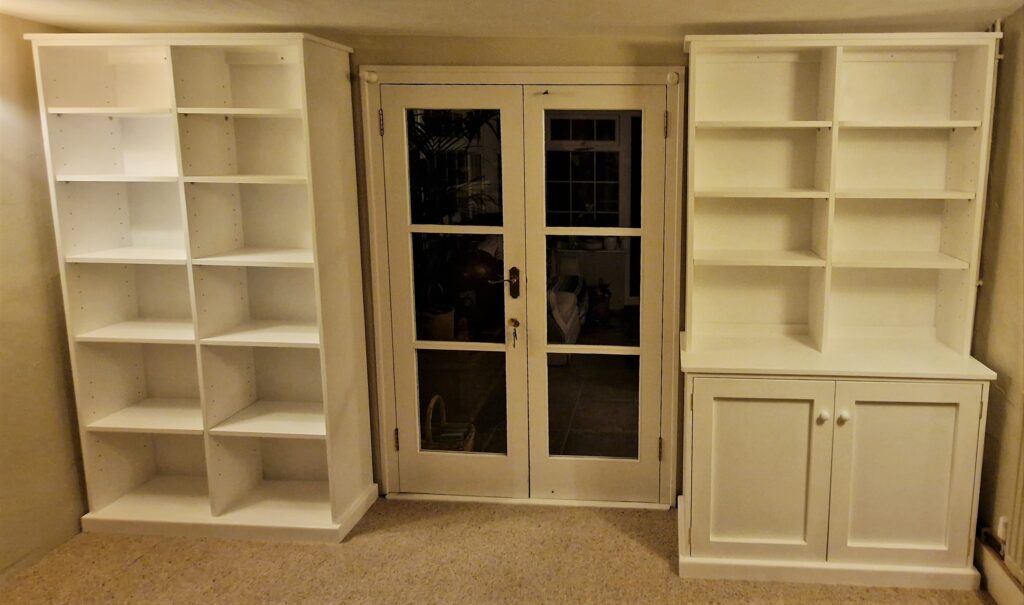White painted country rustic style bespoke large bookcase with moveable shelves, handmade by Marc Wood Furniture in Somerset UK
