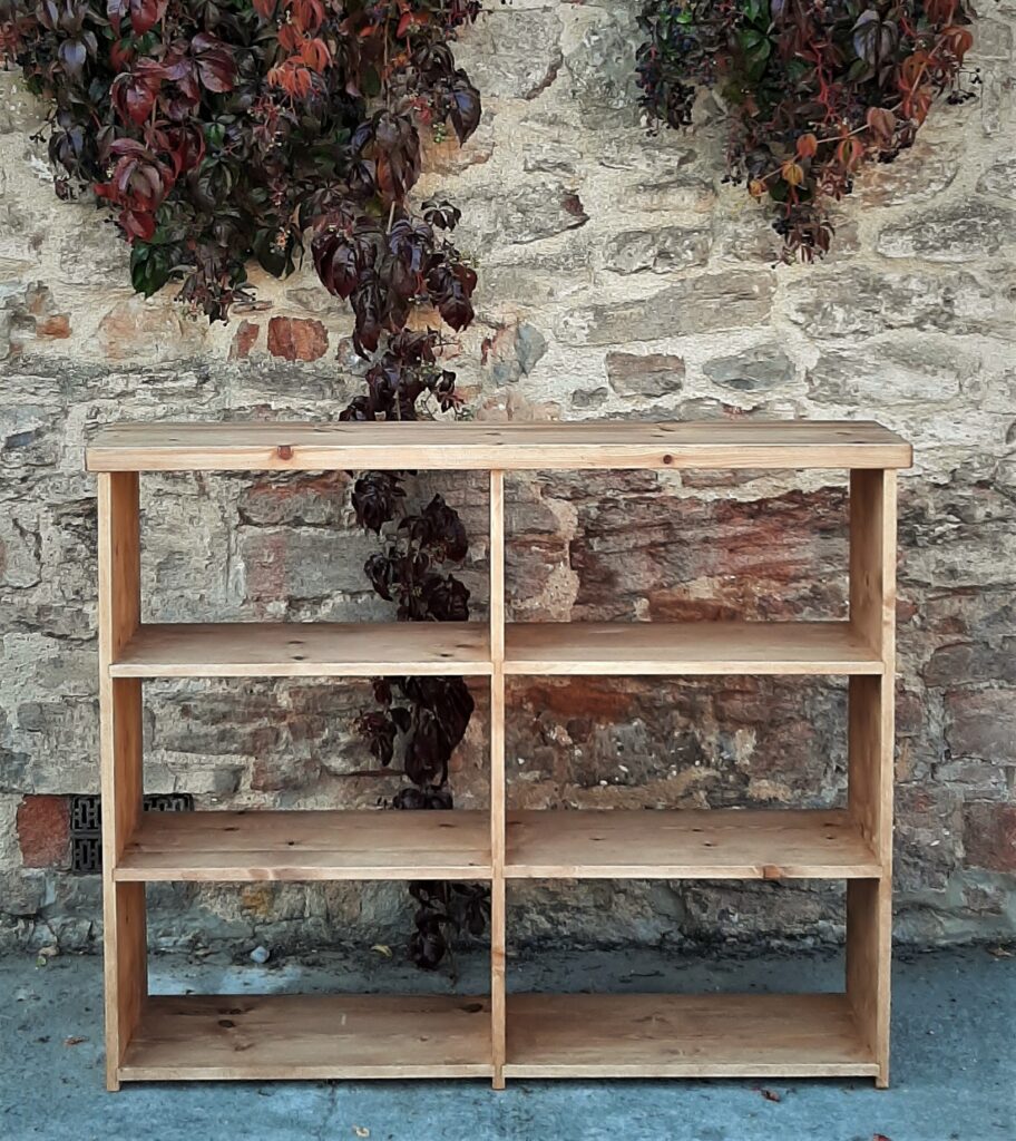 Large wooden bookcase and shelving unit handmade to a bespoke size by Marc Wood Furniture in Somerset UK.