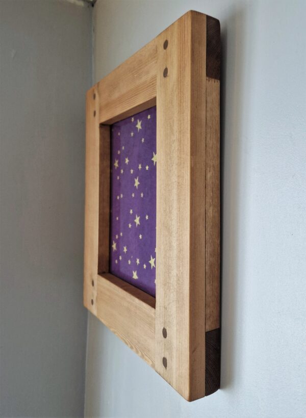 Wooden picture frame for 8 x 10 inch photo, extreme side view. Bespoke handmade in Somerset UK.