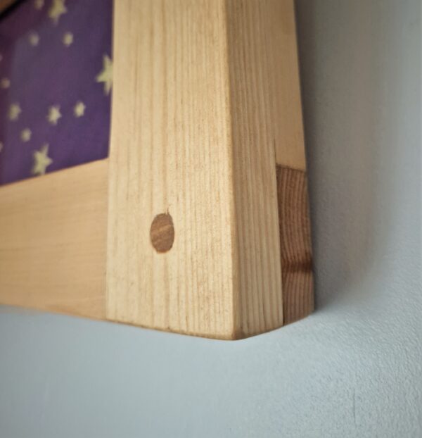 Small wooden picture frame, for 5 x 7 inch photo. Chunky wooden frame. corner view. Handmade in rustic Somerset UK