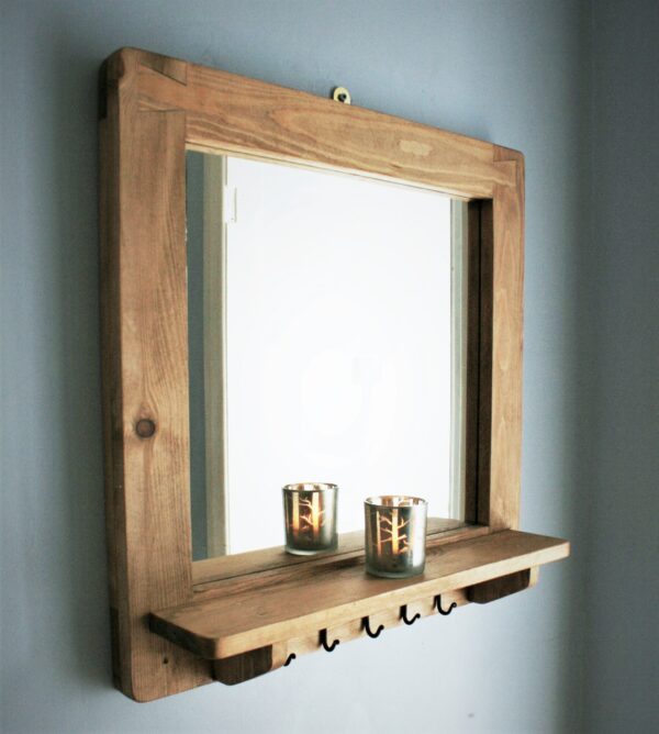 Mirror with shelf and hooks, minimalist rustic wooden bathroom and hallway mirror handmade in Somerset UK. Side view.