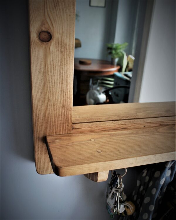 Mirror with shelf and hooks, minimalist rustic wooden bathroom and hallway mirror handmade in Somerset UK. High view.