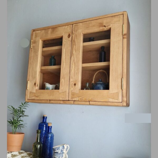 Glazed kitchen display cabinet- underneath our modern rustic wooden cabinet from Somerset UK