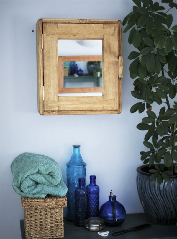 Small bathroom mirror cabinet with minimalist integrated handle. Handmade in Somerset UK in rustic cottage style; front view.