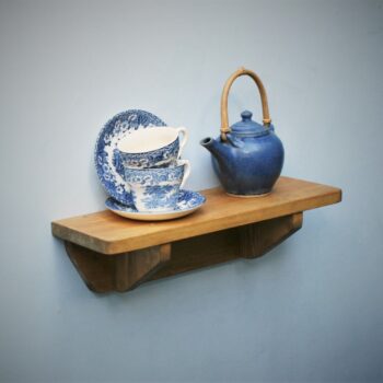 Small wooden kitchen shelf in chunky natural wood. For cookery books and plants, high view. Handmade in Somerset UK