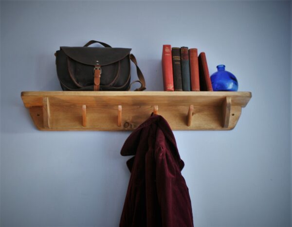 Hallway shelf with hooks and rustic wooden coat rack. Close front view. Designed and handmade in Somerset UK
