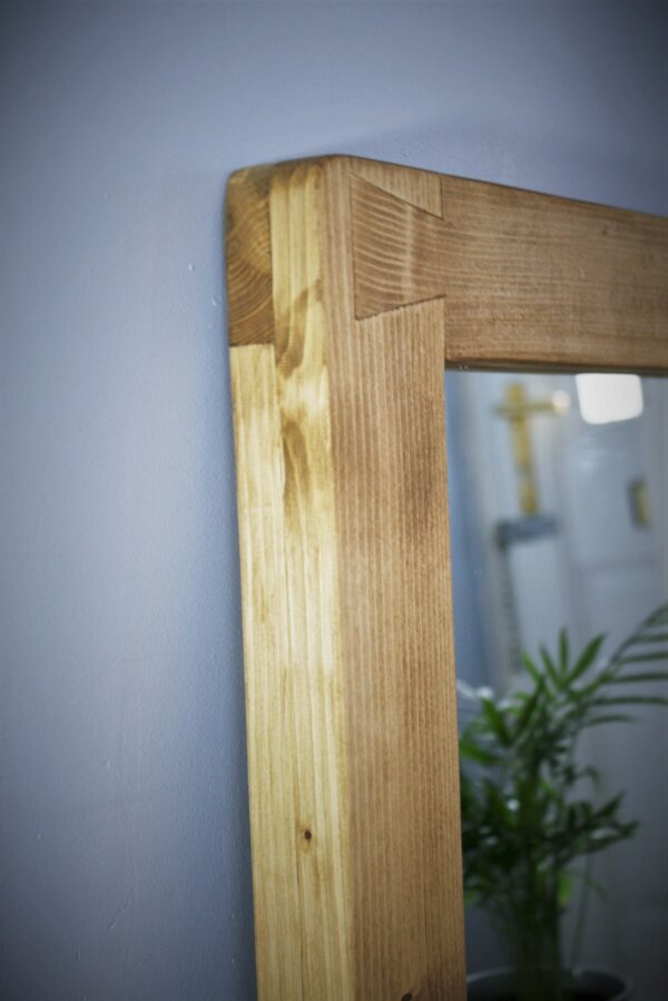 Wooden wall mirror, upper dovetail joint detail.