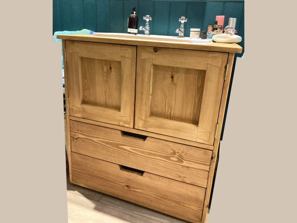 Sink stand with drawers in natural rustic wood for farmhouse wooden bathroom. Handmade in Somerset UK.