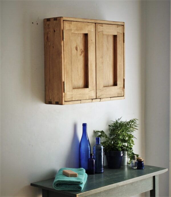 Bathroom cabinet without mirror, natural wood side view. Minimalist rustic, handmade in Somerset UK.