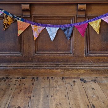 Colourful silk bunting, handmade from recycled sari silks, patterned decorative flags, boho garland, bright fabric swags for garden