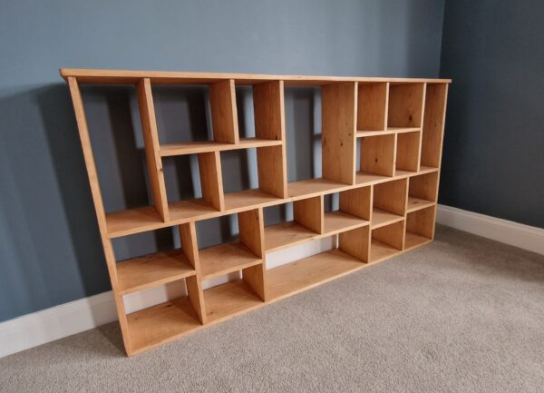 Wide irregular bookcase in chunky natural wood, deep shelves, uneven modern rustic bookcase and room divider custom handmade in Somerset UK