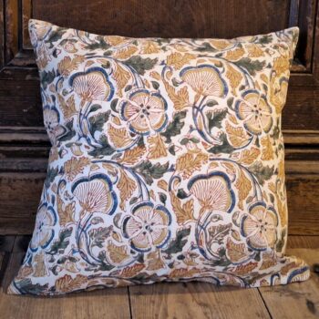 Arts and crafts cushion cover in Kalamkari fabric, terracotta, blue and green tones. Ethical homeware, fair trade from Somerset UK. Close view.