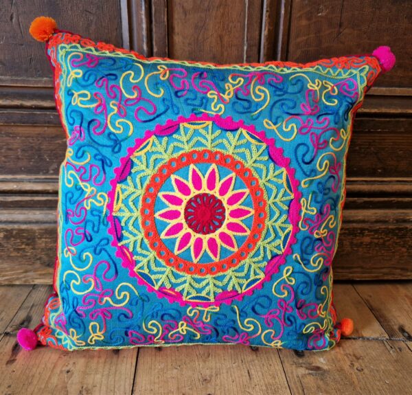Colourful applique cushion cover, bright mandala motif in jewel tones. Bohemian rustic home accessories from Somerset UK