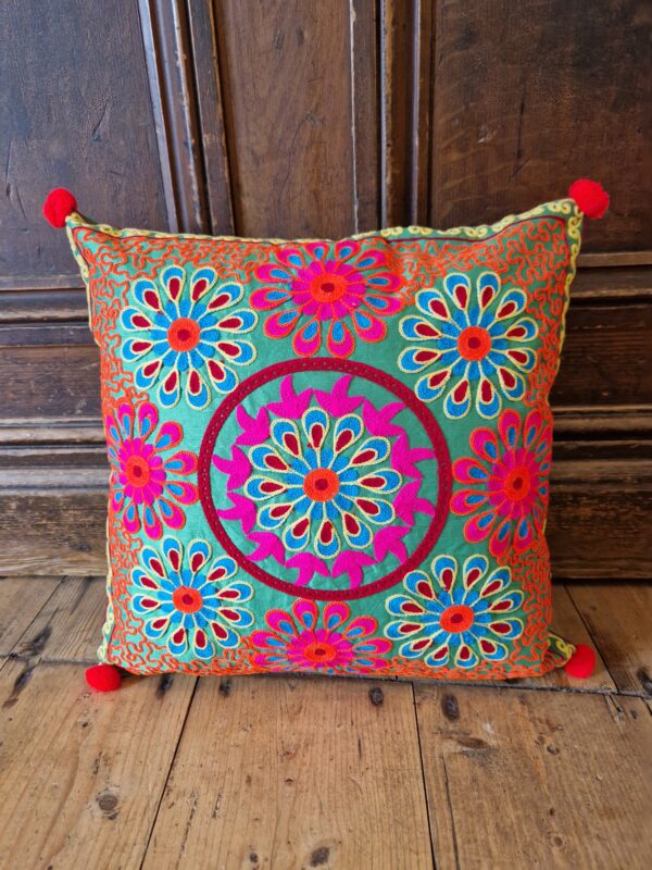 Embroidered bohemian cushion cover, vivid pattern in pretty jewel tones - ethical bohemian rustic homeware from Marc Wood Furniture in Somerset.
