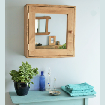 Large wooden bathroom cabinet in rustic natural wood, handmade in Somerset UK, front view.