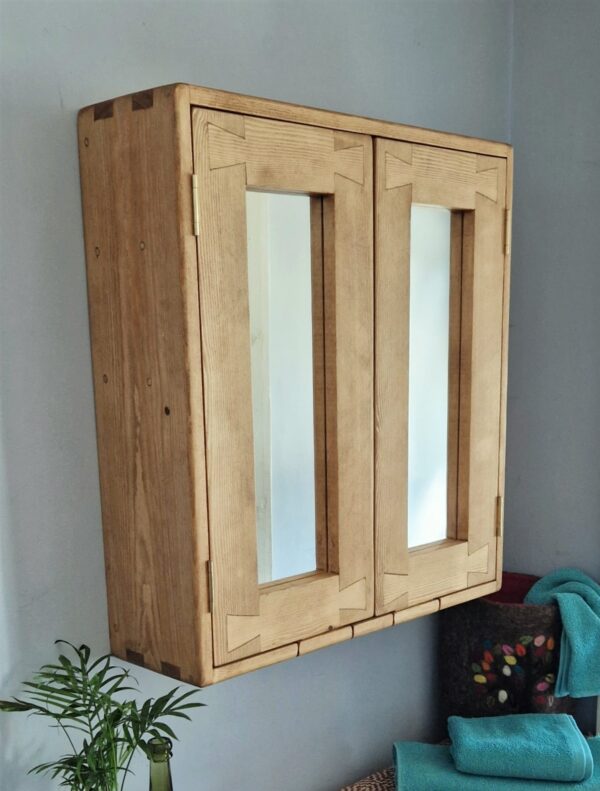 Wooden medicine cabinet with mirror doors, side view, custom handmade in Somerset UK