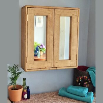 Wooden medicine cabinet with mirror doors in modern rustic pale wood custom handmade in Somerset UK