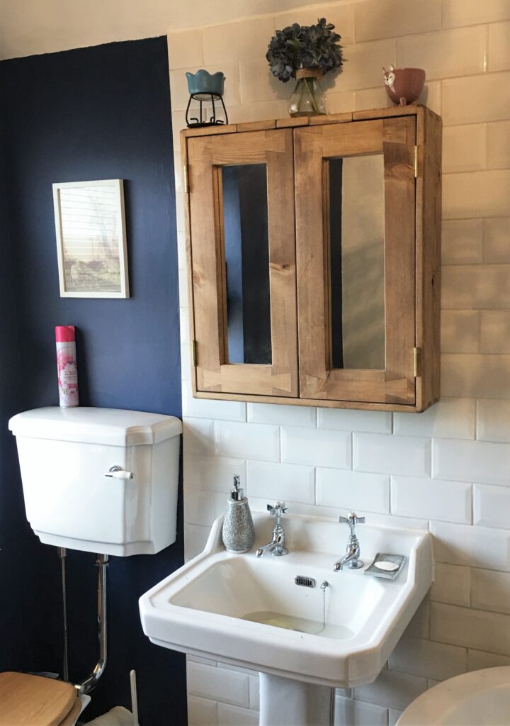 Modern rustic wooden bathroom cabinet, with double mirror doors, handmade in Somerset UK.