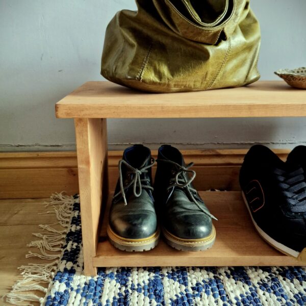 Low wooden shoe rack, modern rustic single tier shoe shelf, traditional furniture making from Somerset UK, side detail.