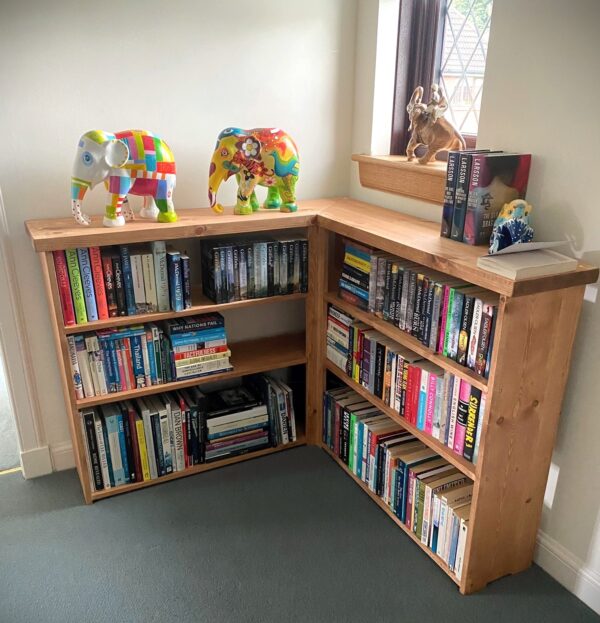 Bespoke rustic corner bookcase in natural wood, as seen in it's new home.