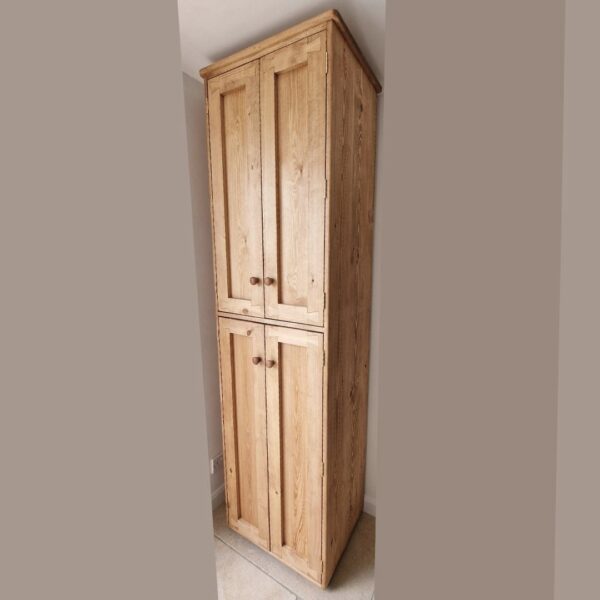 Large bathroom armoire cabinet, tall wooden linen cabinet with shelves handmade in Somerset UK from natural wood.