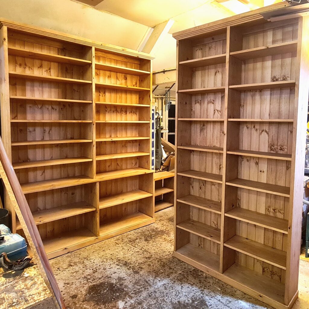 Large library bookcases in rustic natural wood. Seen in our Somerset workshop before delivery.