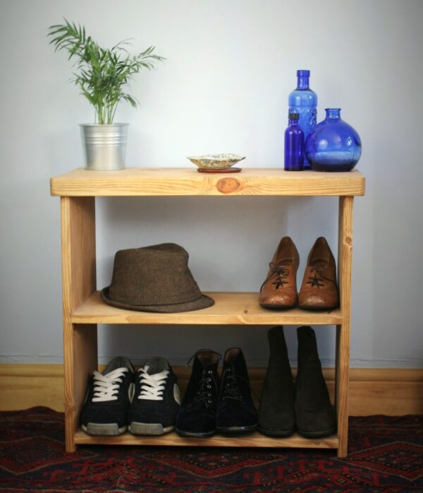Rustic wooden shoe bench, boot room or hallway shoe storage rack in natural, sustainable wood from Somerset UK, front view.