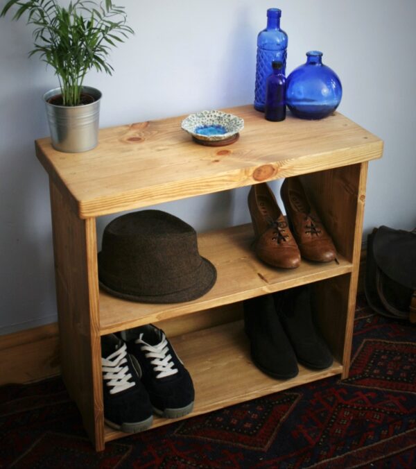 Rustic wooden shoe bench, boot room or hallway shoe storage rack in natural, sustainable wood from Somerset UK, top view.
