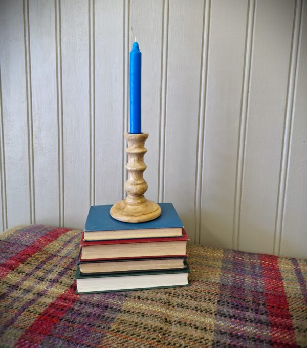 Chunky wooden candle stick, hand carved rustic candle holder, on vintage book stack, from Somerset UK