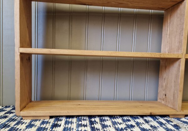Rustic double bookcase, freestanding with small feet, wooden bookshelves handmade in Somerset UK.
