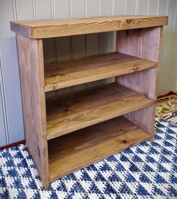 Low wooden bookcase, modern rustic bookshelves, side view, handmade in Somerset UK