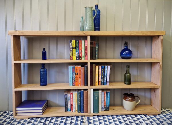 Rustic double bookcase and compartment shelving unit, wide, slim wooden bookshelves handmade in Somerset UK, close up