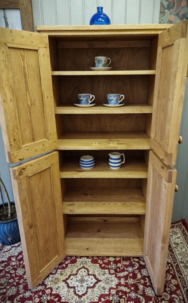 Large rustic larder cupboard and pantry cabinet, farmhouse cottage style sustainable wooden kitchen storage in Somerset UK