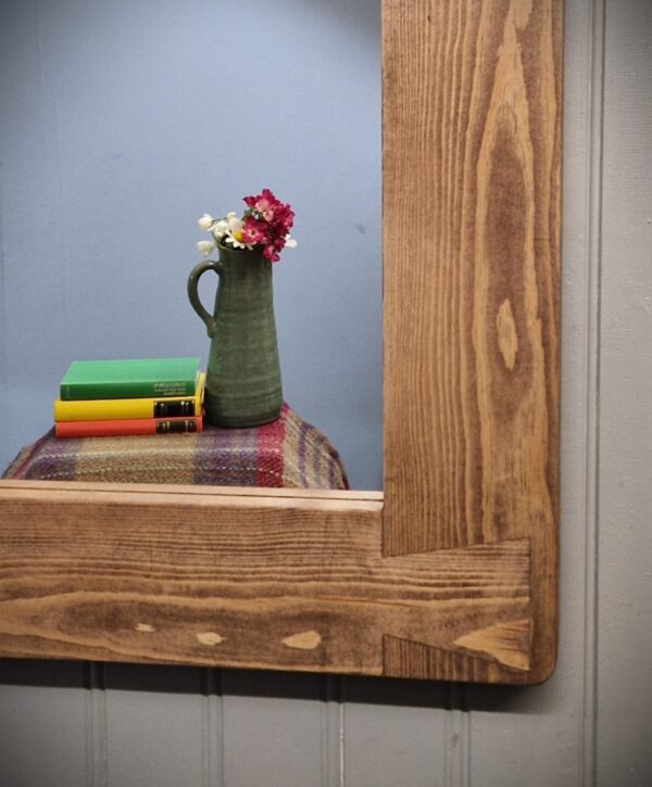 Wide frame wooden mirror in sustainable natural wood handmade in Somerset with our dovetail decoration.