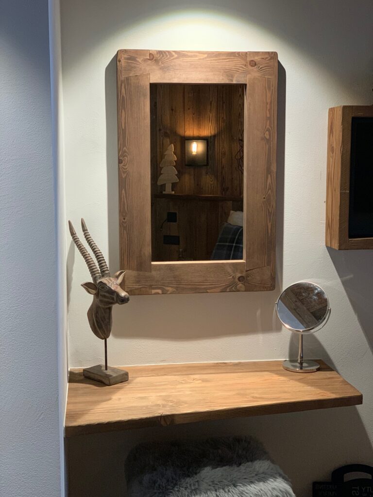 Dark wood alcove mirror with a chunky wooden frame, handmade in Somerset UK