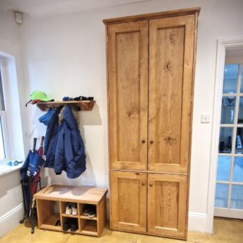 Rustic wooden hallway cupboard, farmhouse cottage tall coat and shoe cupboard in natural wood. Bespoke handmade in Somerset UK