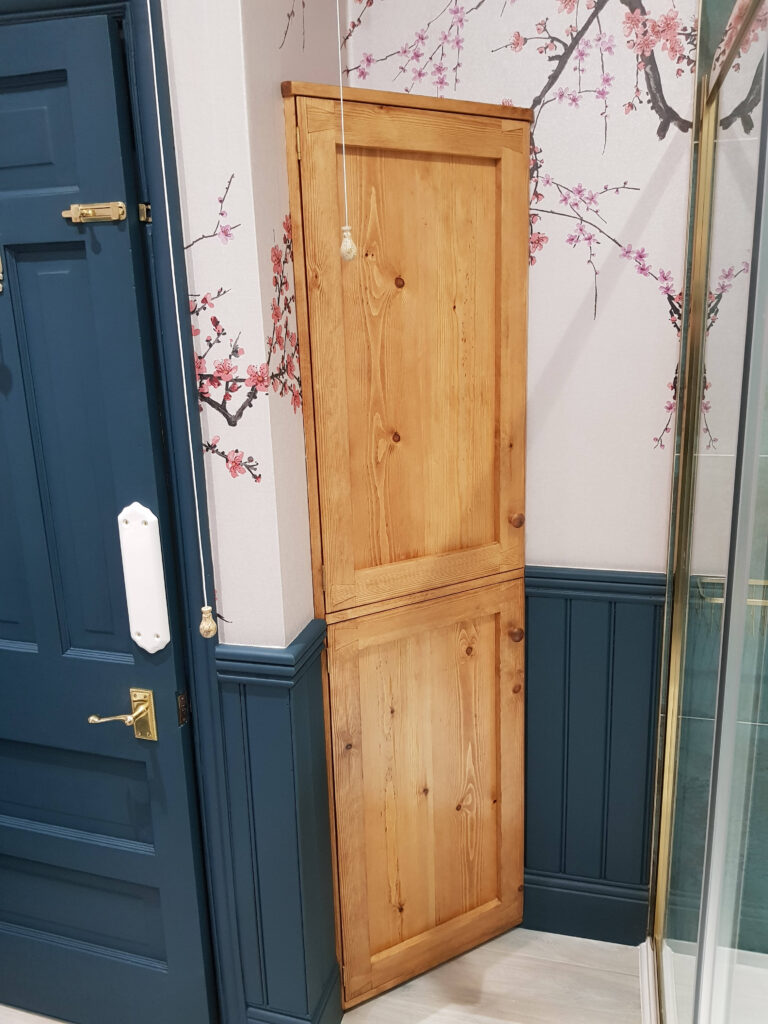 Tall corner cabinet for bathroom storage in natural wood, minimalist rustic freestanding double cupboard handmade in Somerset UK