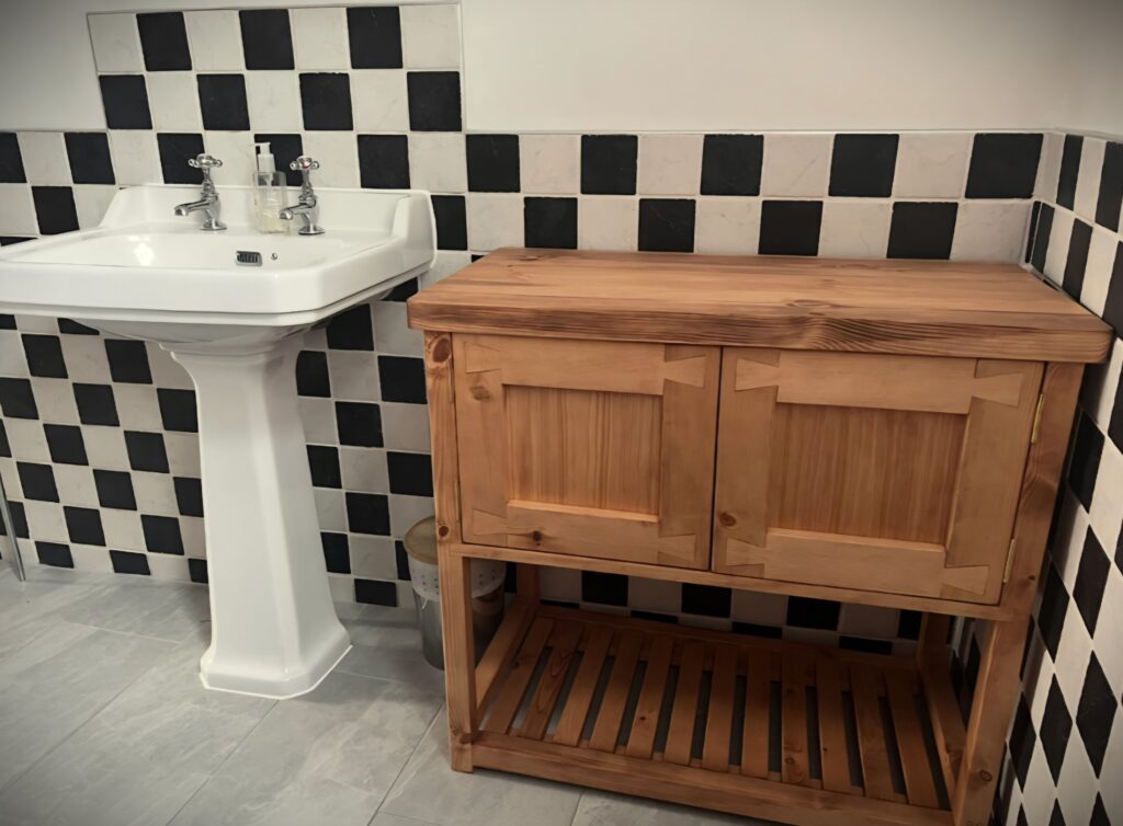 Rustic sink cabinet with a slatted shelf, luxury bespoke wooden bathroom vanity handmade in Somerset UK