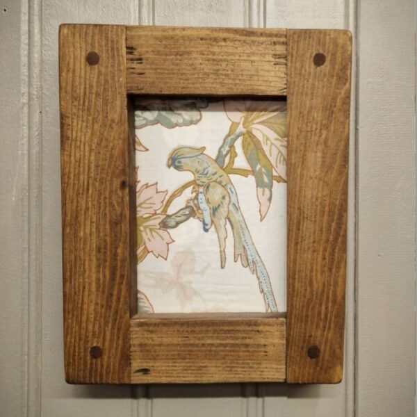 Small rustic wooden frame with a single dowel, chunky photo and picture frame in light and dark wood, from Somerset UK